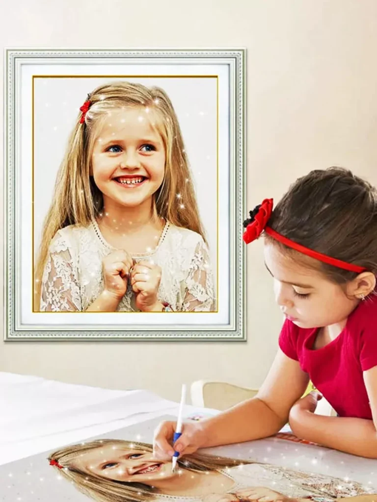 little girl painting with gems
